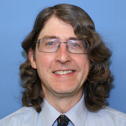 Associate Professor of Astronomy-Physics John Martin