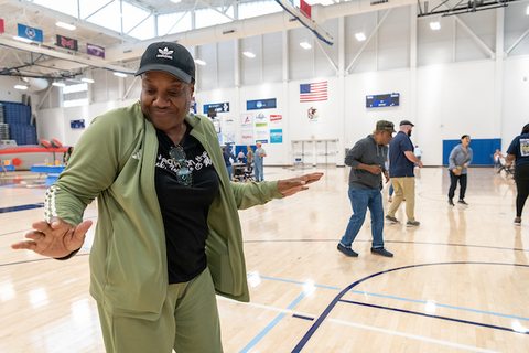 Family members dance at BBQ hosted during family weekend.