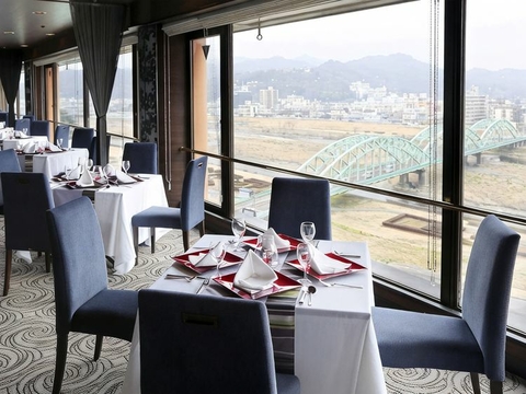 Hotel restaurant view overlooking the river and town of Ashikaga, Japan. 