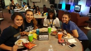 STARS students enjoying a meal together at the former Stars Lounge