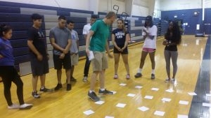 STARS students participating in a team building event in the TRAC gymnasium