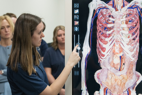 A student interacts with a virtual anatomy display, showcasing a digital human body in a classroom setting.