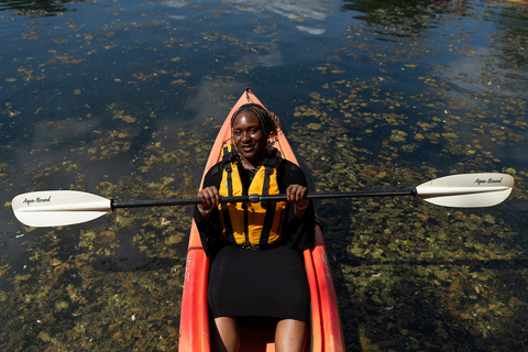 student kayaking