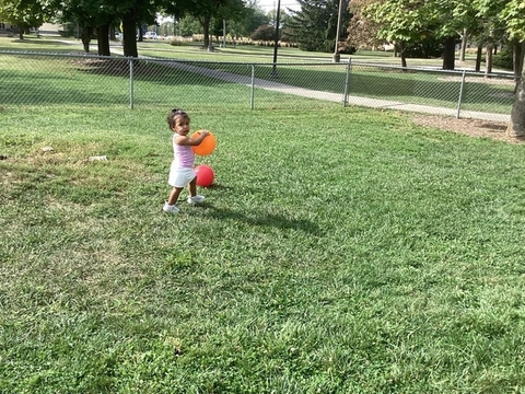 child playing with a ball