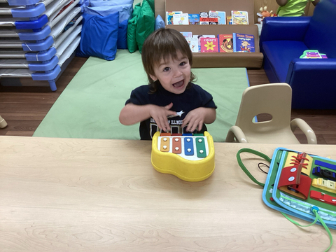 child playing music