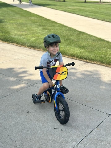 child riding bike