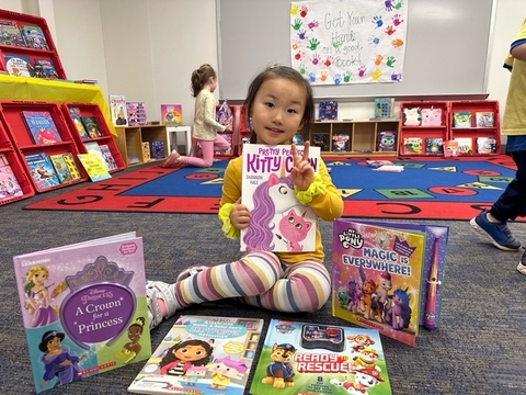 a child browses the book fair