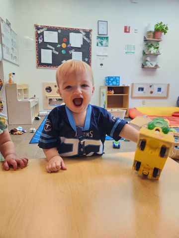 child playing with a toy