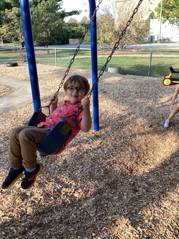 child on swing