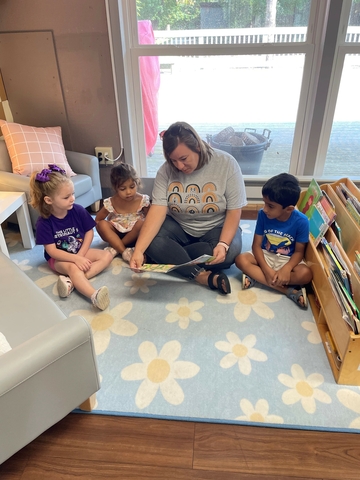 teacher reading to children