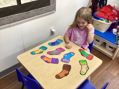 child playing matching game