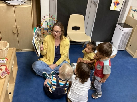 teacher reading to children