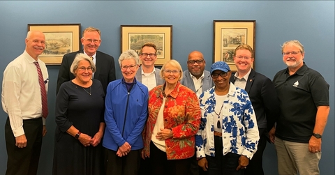 Advisory board members with Center for Lincoln Studies Director pose in two rows. 