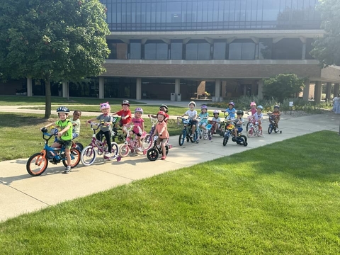 children riding bicycles