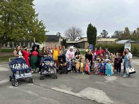 center children and staff in costume