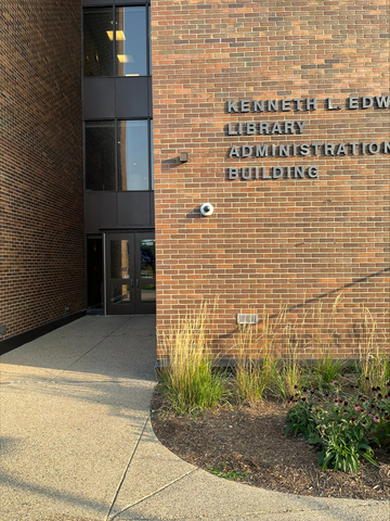 Picture of the double doors to the library and admissions building.