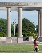 Students walking by UIS Colonnade