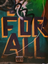 Photo of grafitti - text "For All"