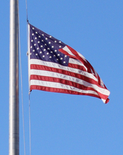 An American flag on a flagpole 