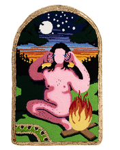 A tapestry shows a pink human figure sitting cross-legged near a campfire, with a snake and nighttime landscape in the background.