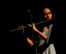 student playing flute