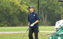 Vilgot Arlebach golfing in rain
