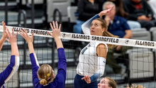 Alexis Schwartz goes up for a kill in volleyball match