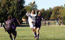 Robin Lemke Bergseth playing soccer in white UIS uniform