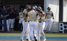 Kaden Griffitts celebrates grand slam with teammates