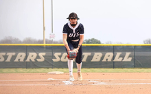 Rosie Bartletti in the circle in blue UIS uniform