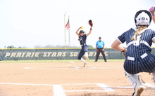 Rosie Bartletti pitching in blue UIS uniform at UIS Softball Field
