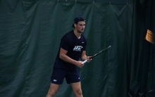 Antonio Ayerbe Streubel playing tennis in UIS uniform