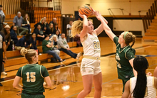 Sydney Moss playing basketball