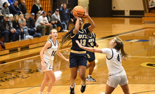 Emari Doby shooting the ball