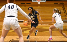 Emari Doby driving up the court