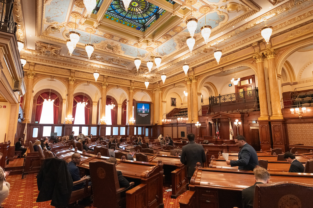 Wide shot of chambers at the Illinois State Capitol where UIS students are participating in Mock IL Government.