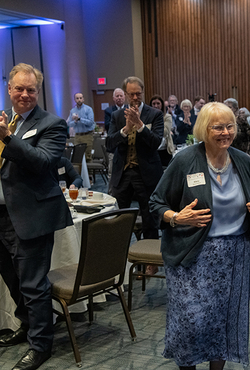 Mary Mitchell Beaumont walks to the stage to receive the 2025 William E. Winter Award.