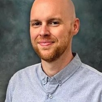 headshot of Brandon Damm
