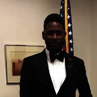 headshot of Joshua Egbedimame