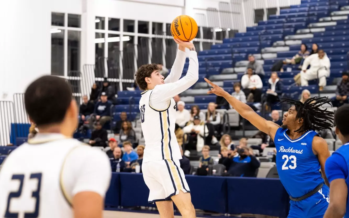 Isaiah Davis shooting a three-point shot