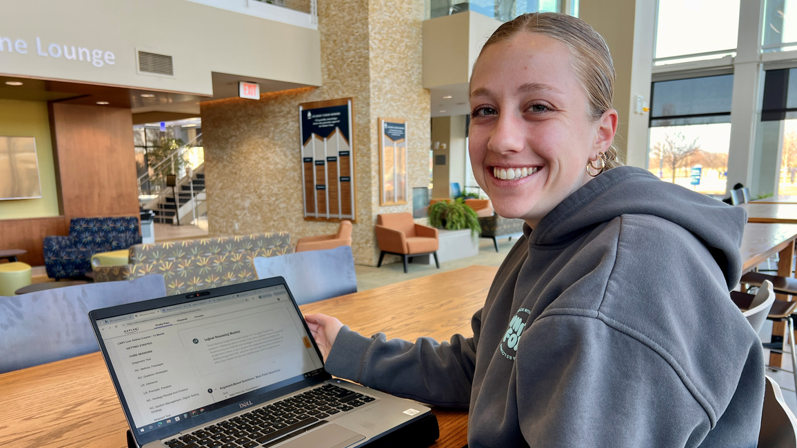 Jordan Serrahn, a MBA student, uses free Kaplan test prep software to study for the LSAT.