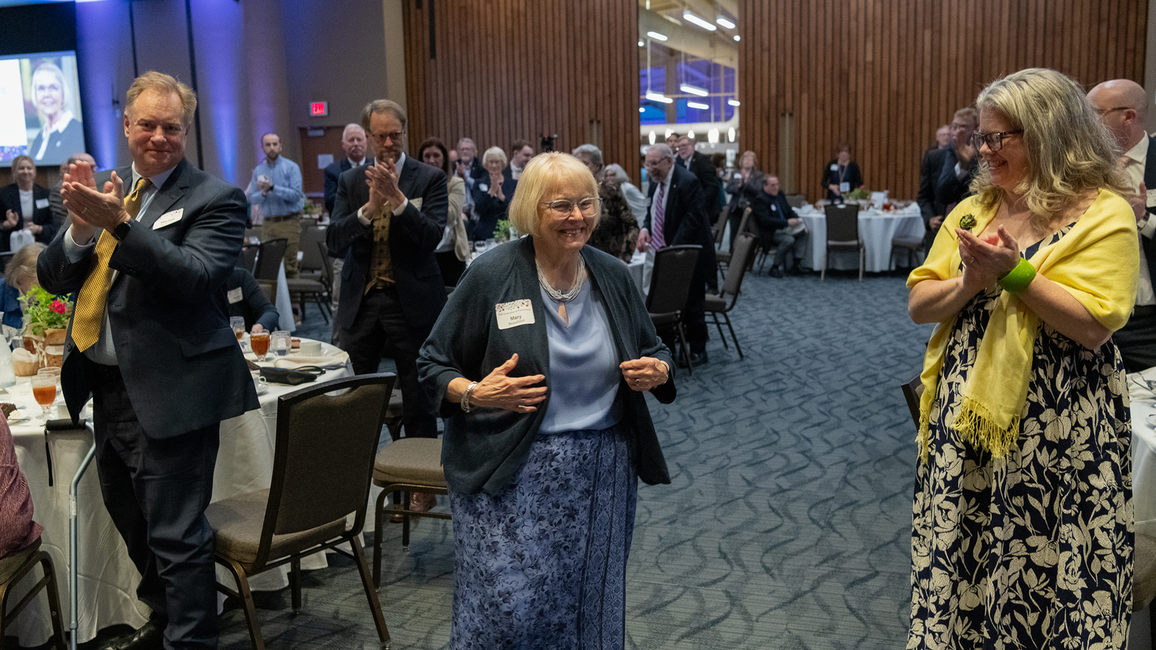Mary Mitchell Beaumont walks to the stage to receive the 2025 William E. Winter Award.