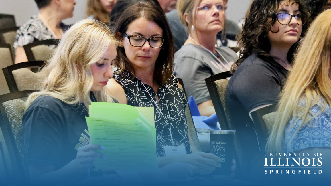 Mother and daughter looking over notes at Orientation.