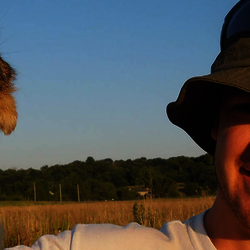 a man holding a small animal