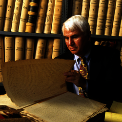 professor in front of books