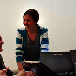 students and professor talking