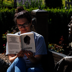 student reading book