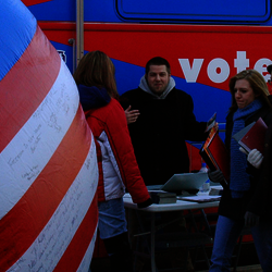 students in voting booth