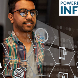 Man with glasses in a dark room, surrounded by tech symbols.