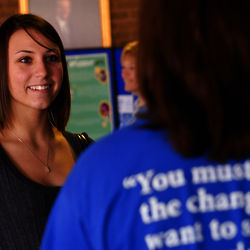 a student volunteering at a center
